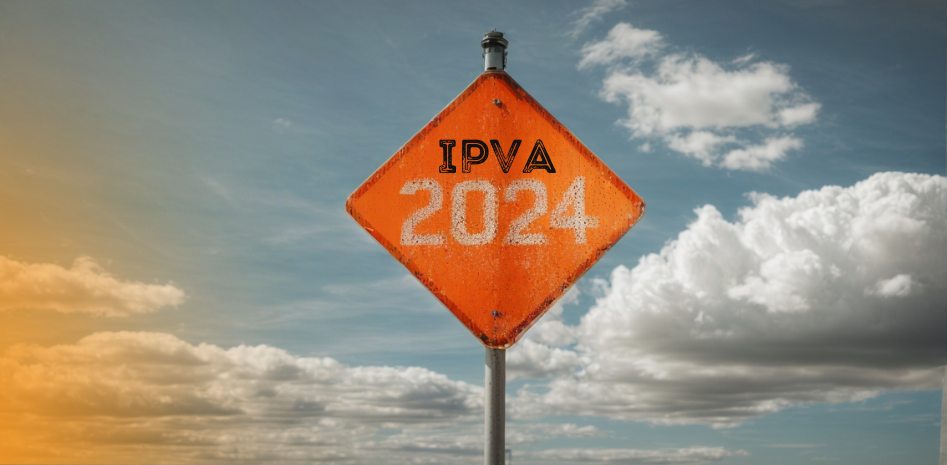 Imagem de uma placa laranja em contraste com o céu azul com a escrita IPVA 2024